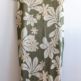 green cotton throw blanket with naupaka print