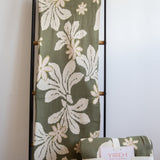 green cotton throw blanket with naupaka print
