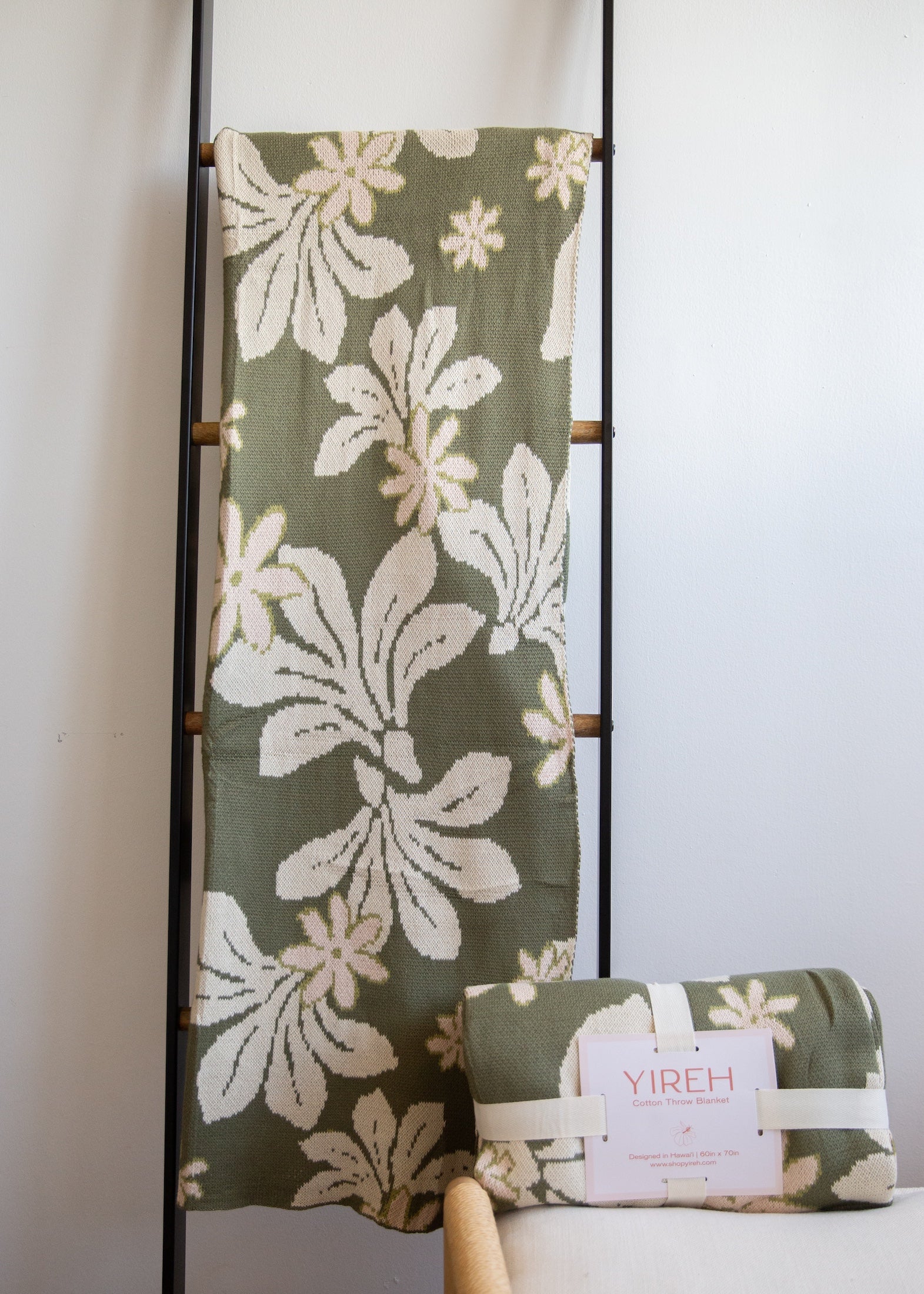 green cotton throw blanket with naupaka print