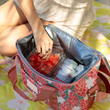 green cooler bag with tiare and red ginger floral pattern