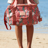 green cooler bag with tiare and red ginger floral pattern