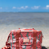 green cooler bag with tiare and red ginger floral pattern