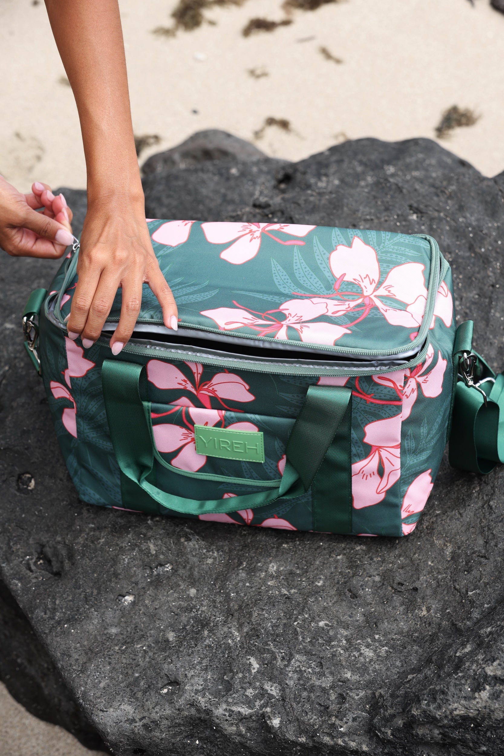 large forest green cooler bag with handle and strap featuring fern and ginger print