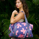 navy blue large travel tote with luggage sleeve, adjustable strap, duster bag, detachable mini pouches, and zipper compartments.