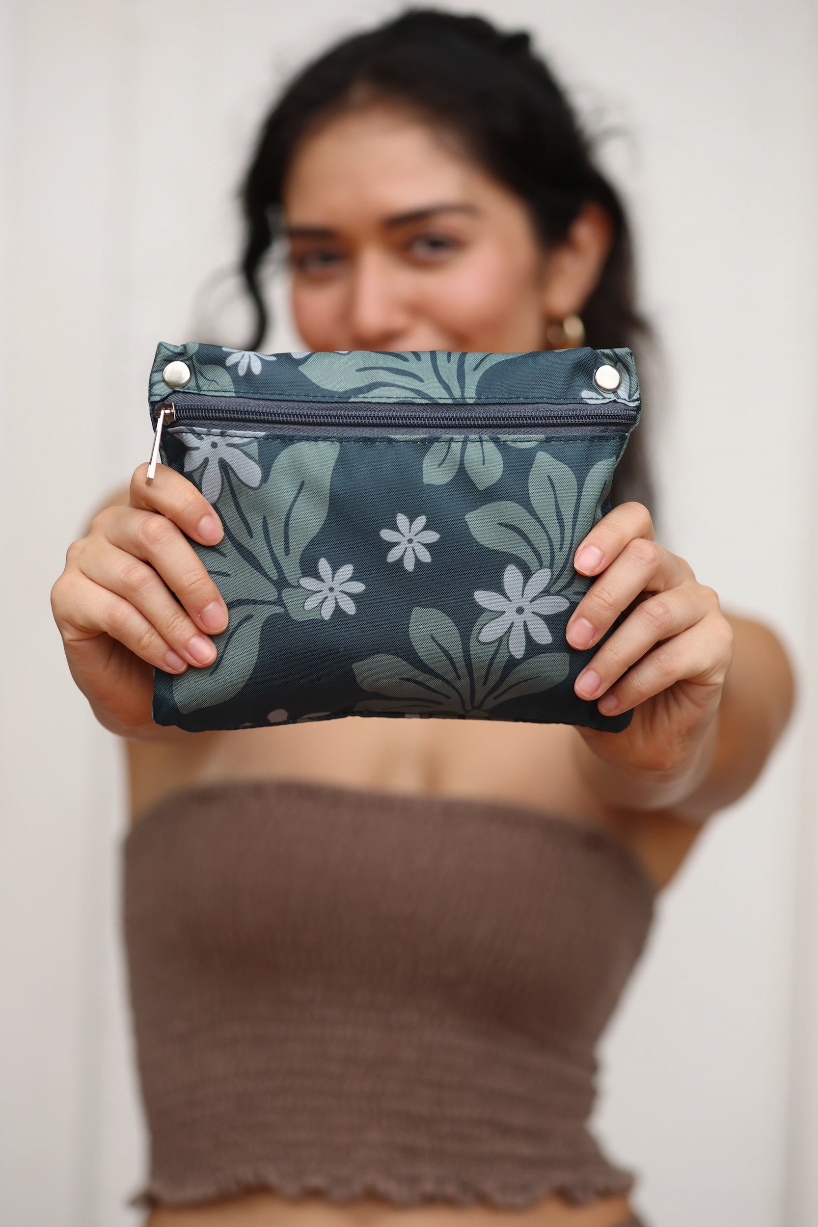 green nylon tote bag with naupaka and tiare print