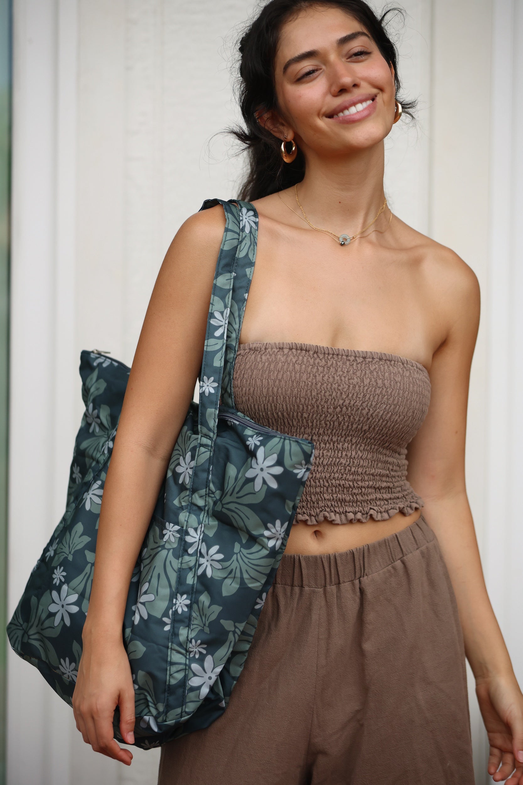 green nylon tote bag with naupaka and tiare print