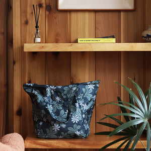 green nylon tote bag with naupaka and tiare print