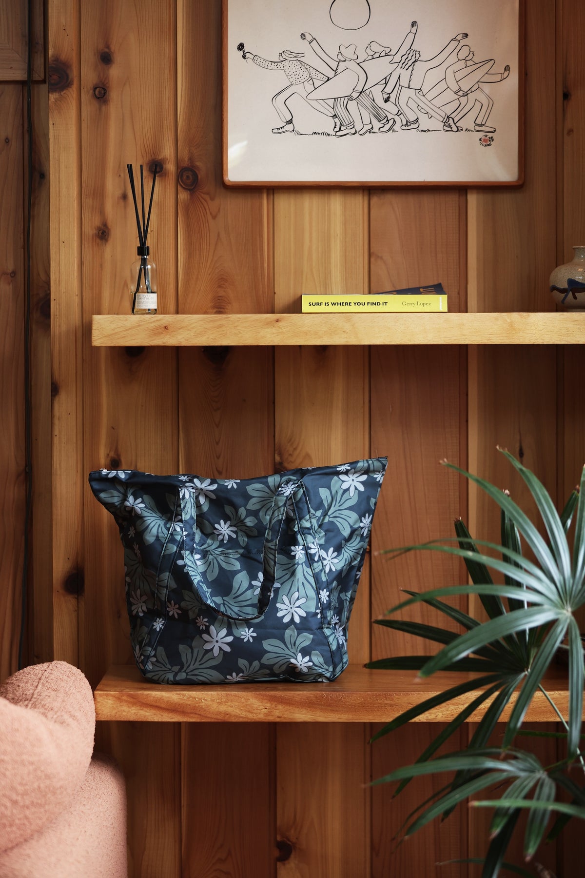 green nylon tote bag with naupaka and tiare print