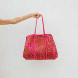 large neoprene tote bag and matching pouch in rusty brown and pink awapuhi print 