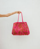 large neoprene tote bag and matching pouch in rusty brown and pink awapuhi print 