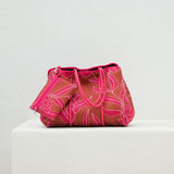 large neoprene tote bag and matching pouch in rusty brown and pink awapuhi print 