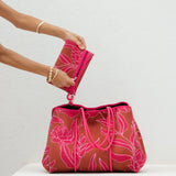 large neoprene tote bag and matching pouch in rusty brown and pink awapuhi print 