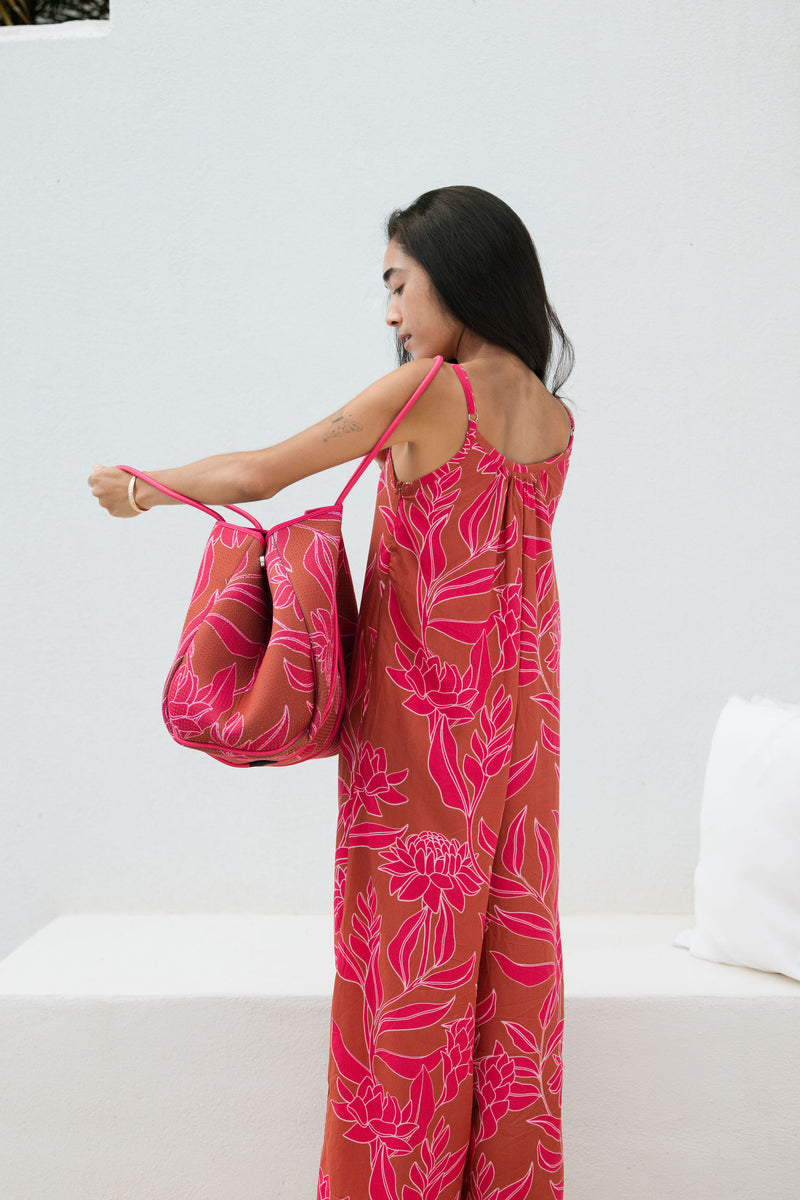 large neoprene tote bag and matching pouch in rusty brown and pink awapuhi print 