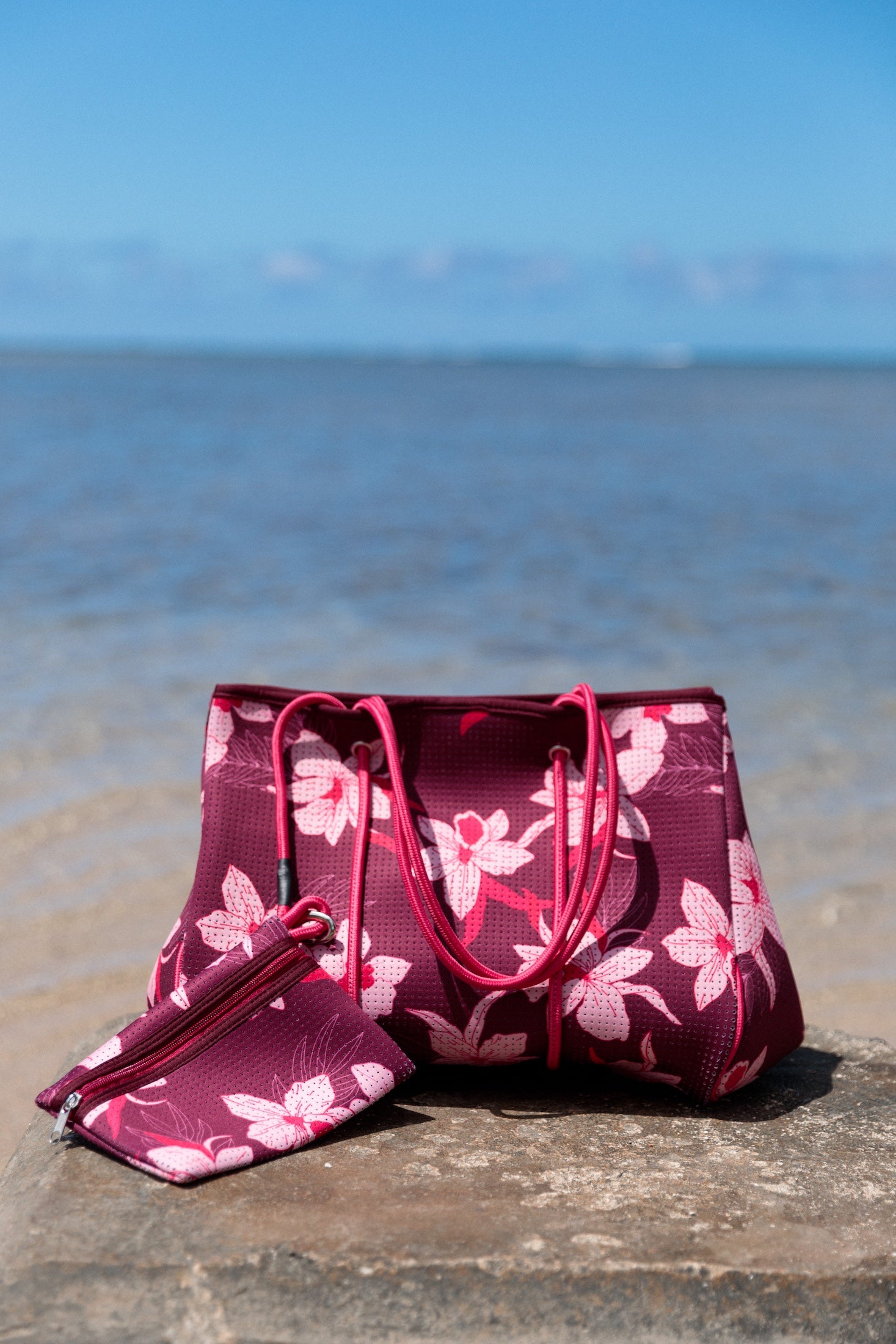 large dark purple neoprene tote bag with orchid pattern 