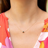 woman wearing keshi pearl snake chain necklace