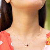 woman wearing keshi pearl snake chain necklace