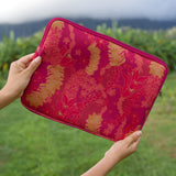 pink padded laptop case with lei print