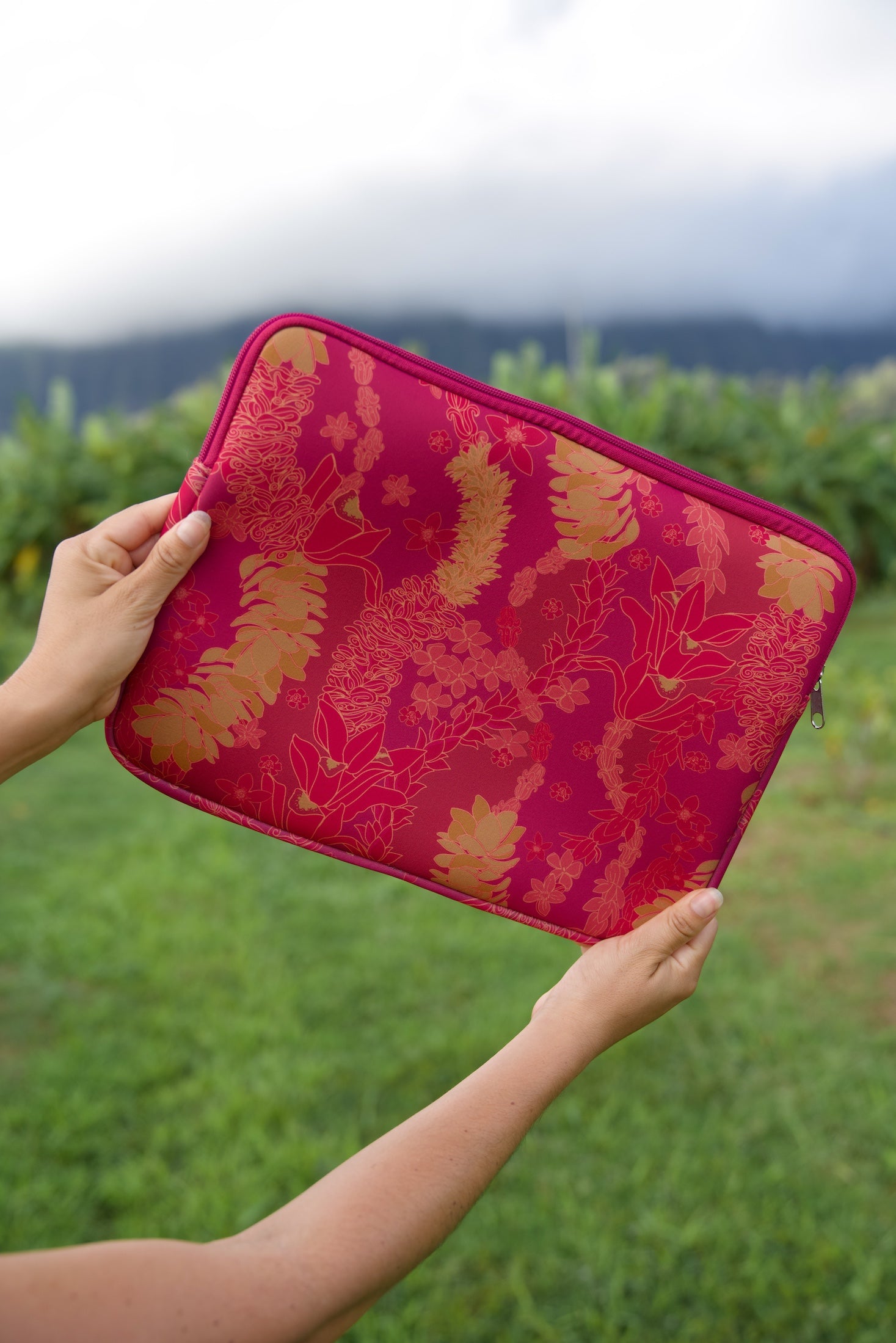 pink padded laptop case with lei print