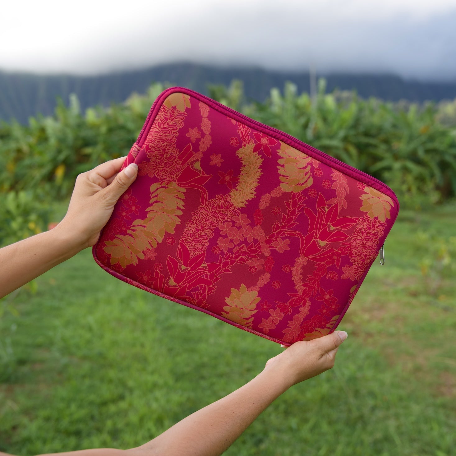 pink padded laptop case with lei print
