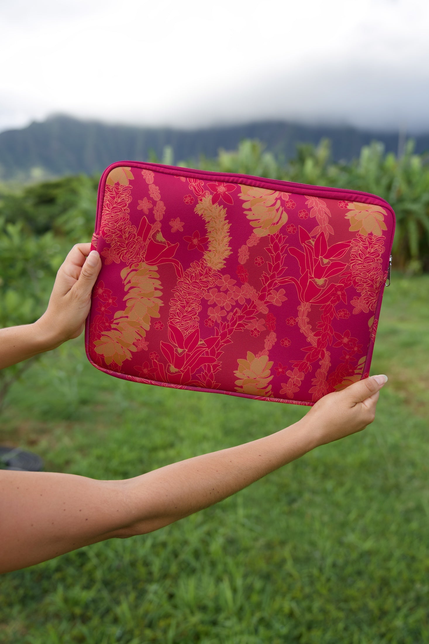 pink padded laptop case with lei print