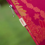 pink padded laptop case with lei print