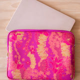 pink padded laptop case with lei print