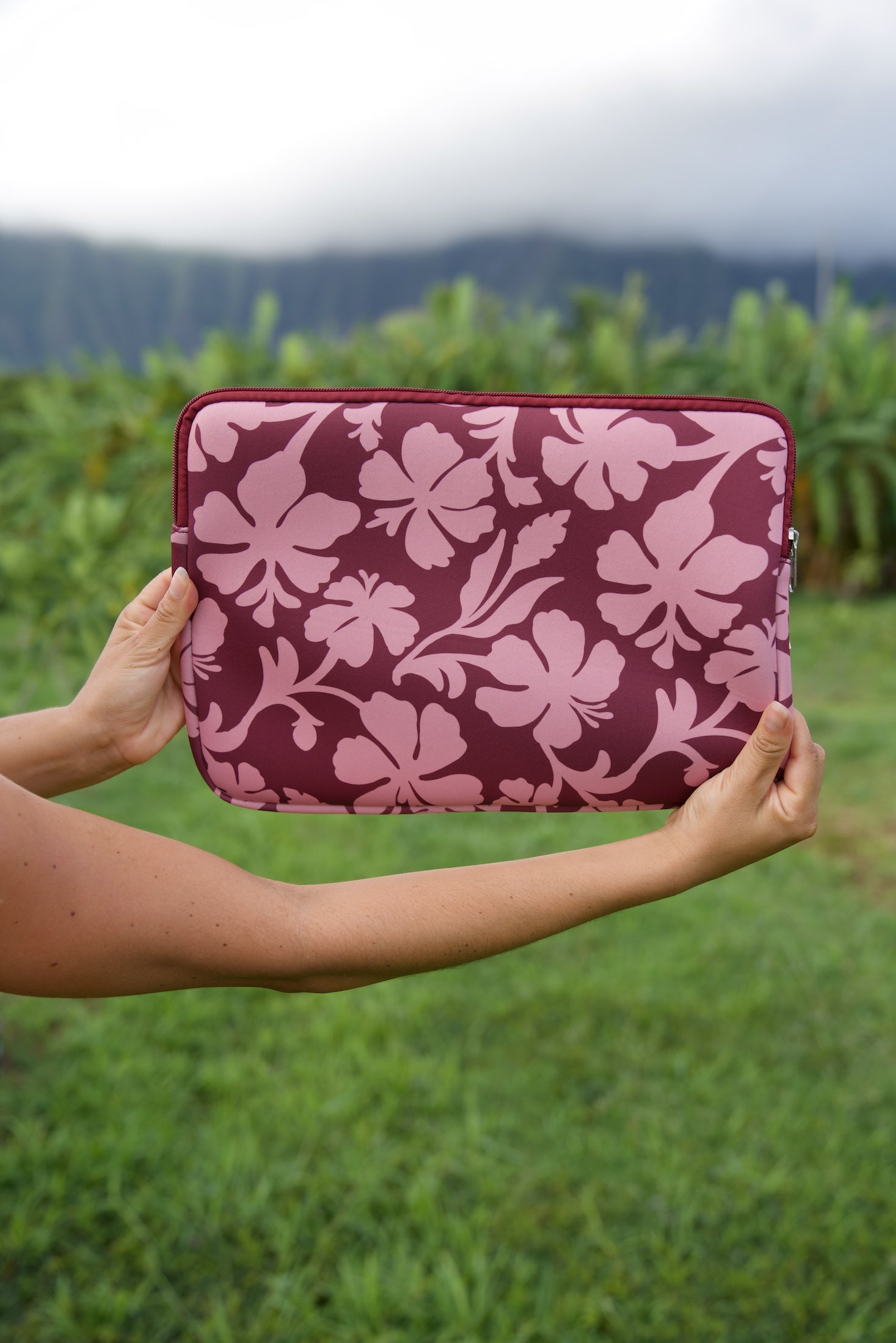 padded laptop case with pink and brown toned hibiscus print