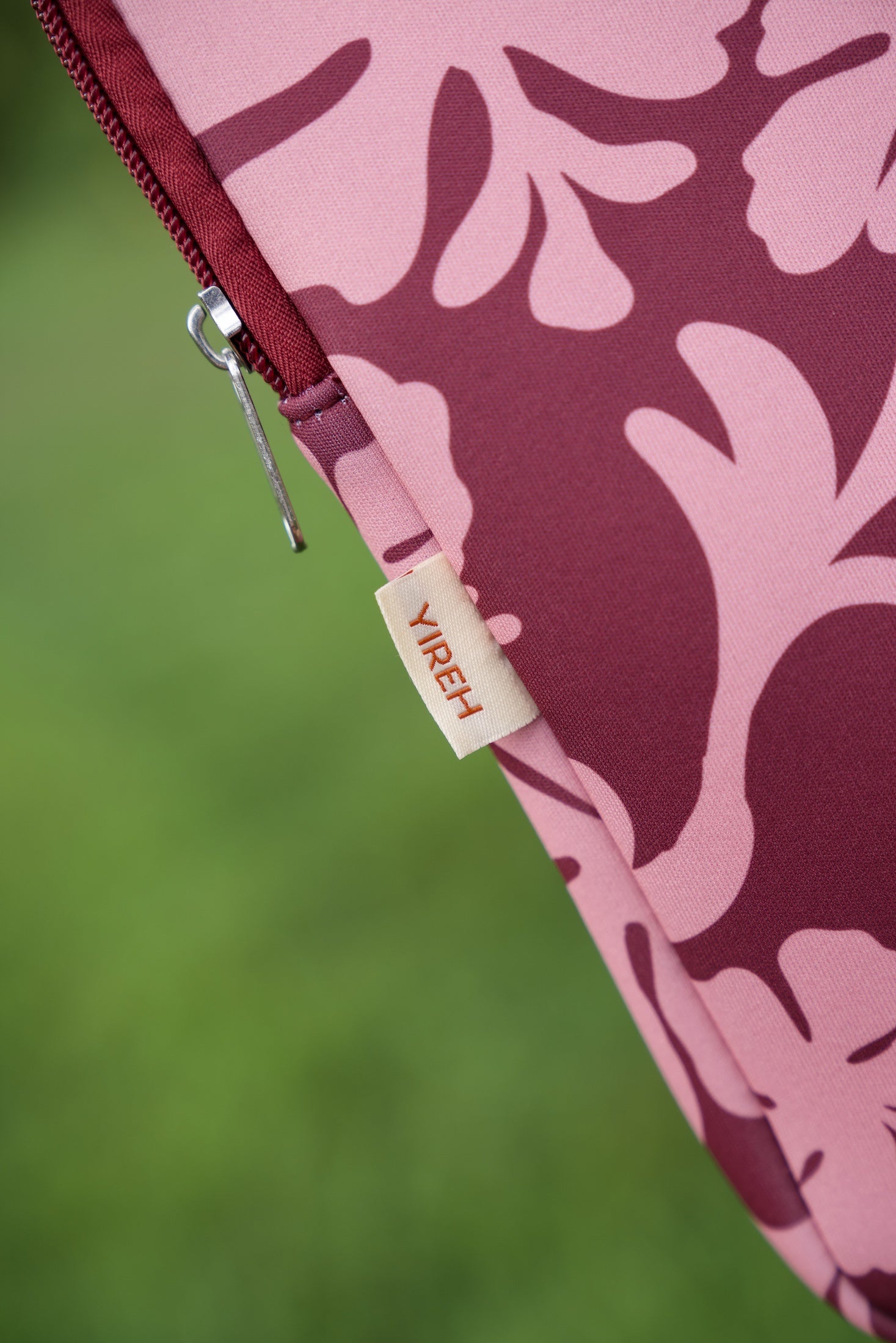 padded laptop case with pink and brown toned hibiscus print