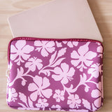 padded laptop case with pink and brown toned hibiscus print