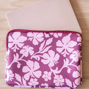 padded laptop case with pink and brown toned hibiscus print