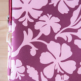 padded laptop case with pink and brown toned hibiscus print