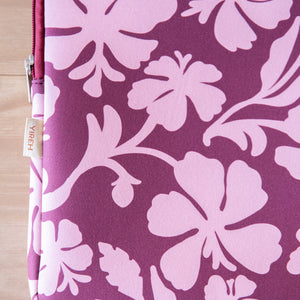 padded laptop case with pink and brown toned hibiscus print