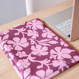 padded laptop case with pink and brown toned hibiscus print