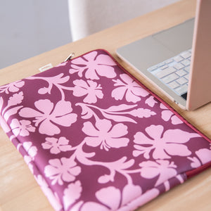 padded laptop case with pink and brown toned hibiscus print