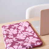 padded laptop case with pink and brown toned hibiscus print