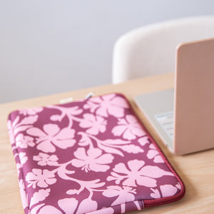 padded laptop case with pink and brown toned hibiscus print