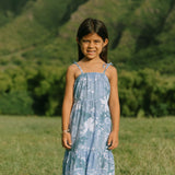 little girl wearing blue paniolo paisley printed dress with tie straps