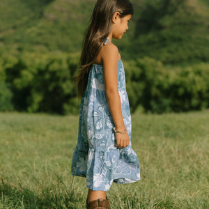 little girl wearing blue paniolo paisley printed dress with tie straps