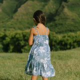 little girl wearing blue paniolo paisley printed dress with tie straps