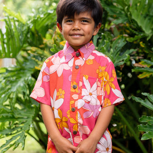 little boy wearing pink mini aloha button up shirt with retro flower print