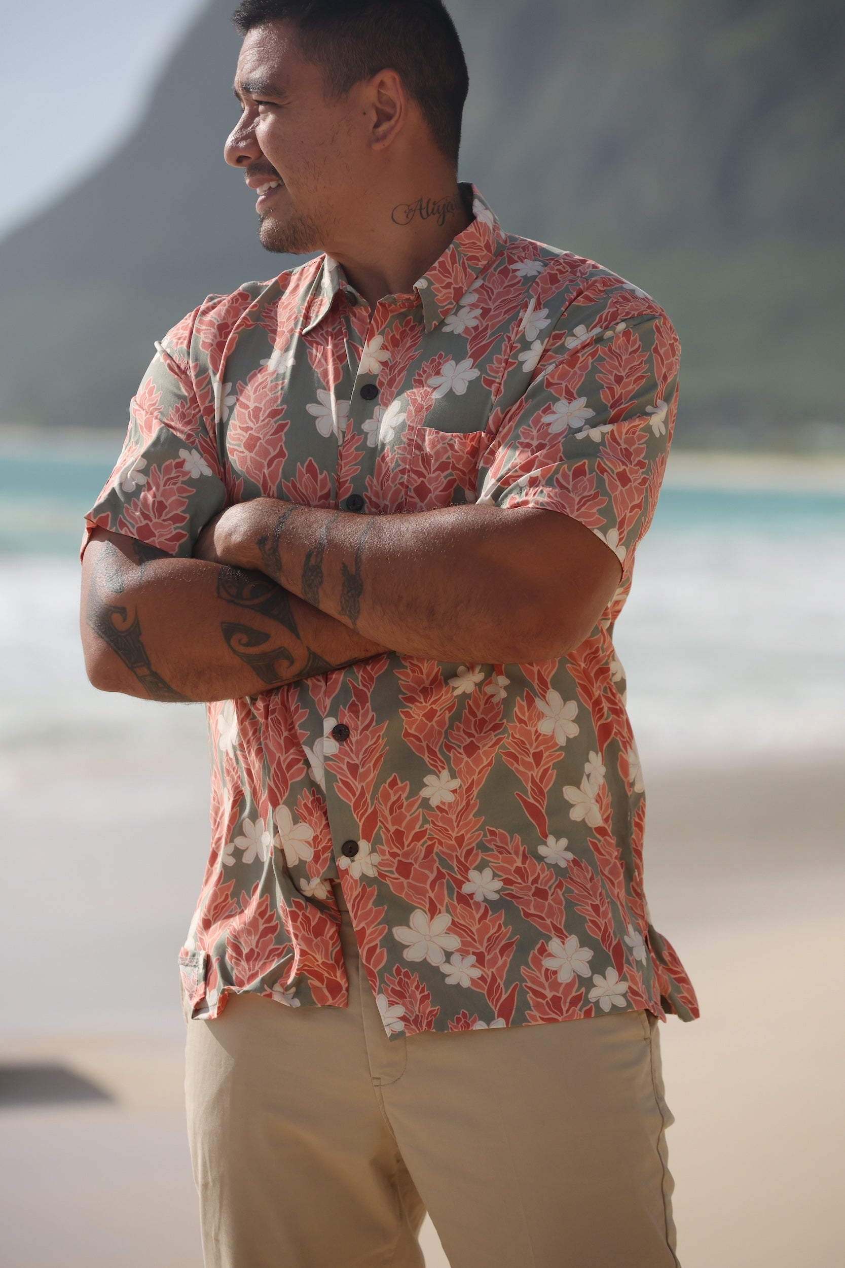 man wearing jade aloha button up with tiare ginger print