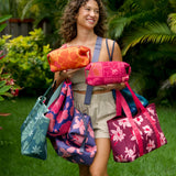 navy blue large travel tote with luggage sleeve, adjustable strap, duster bag, detachable mini pouches, and zipper compartments.