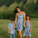 little girl wearing blue paniolo paisley printed dress with tie straps