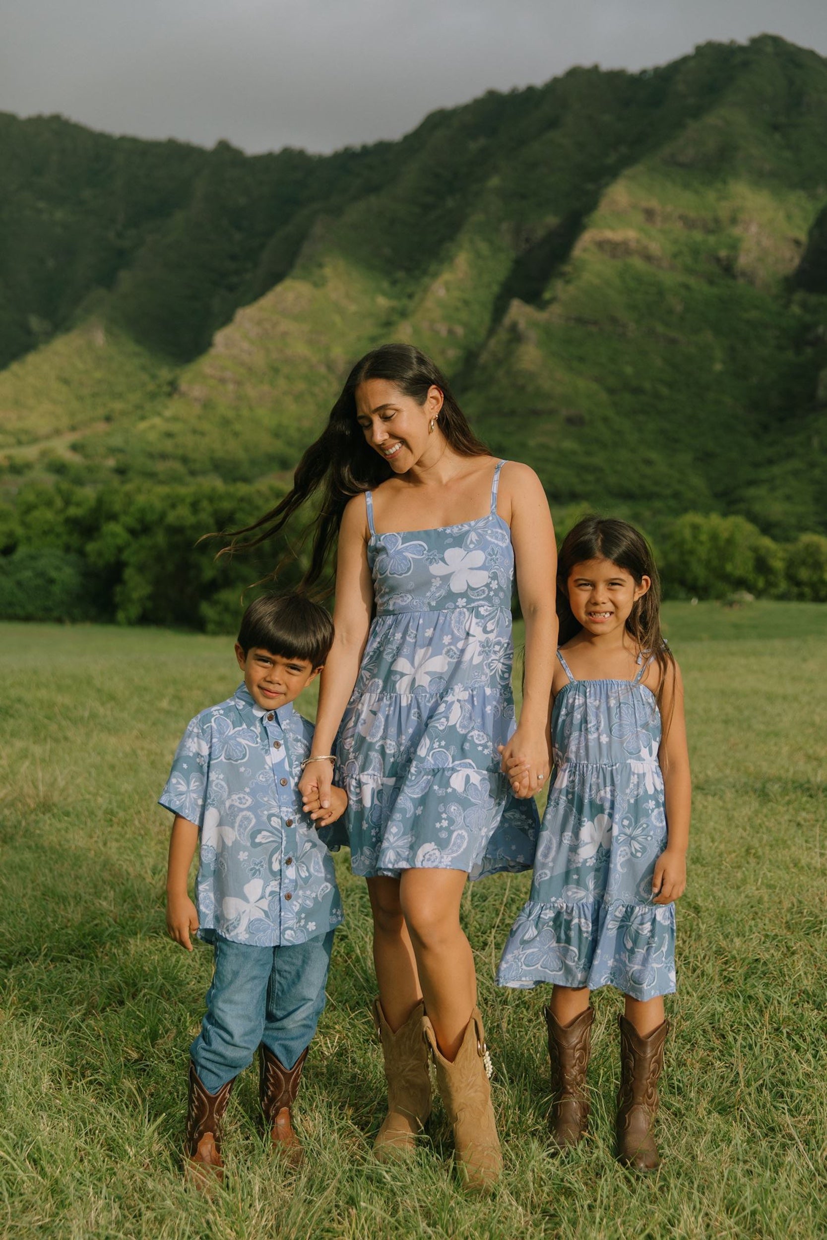 little girl wearing blue paniolo paisley printed dress with tie straps