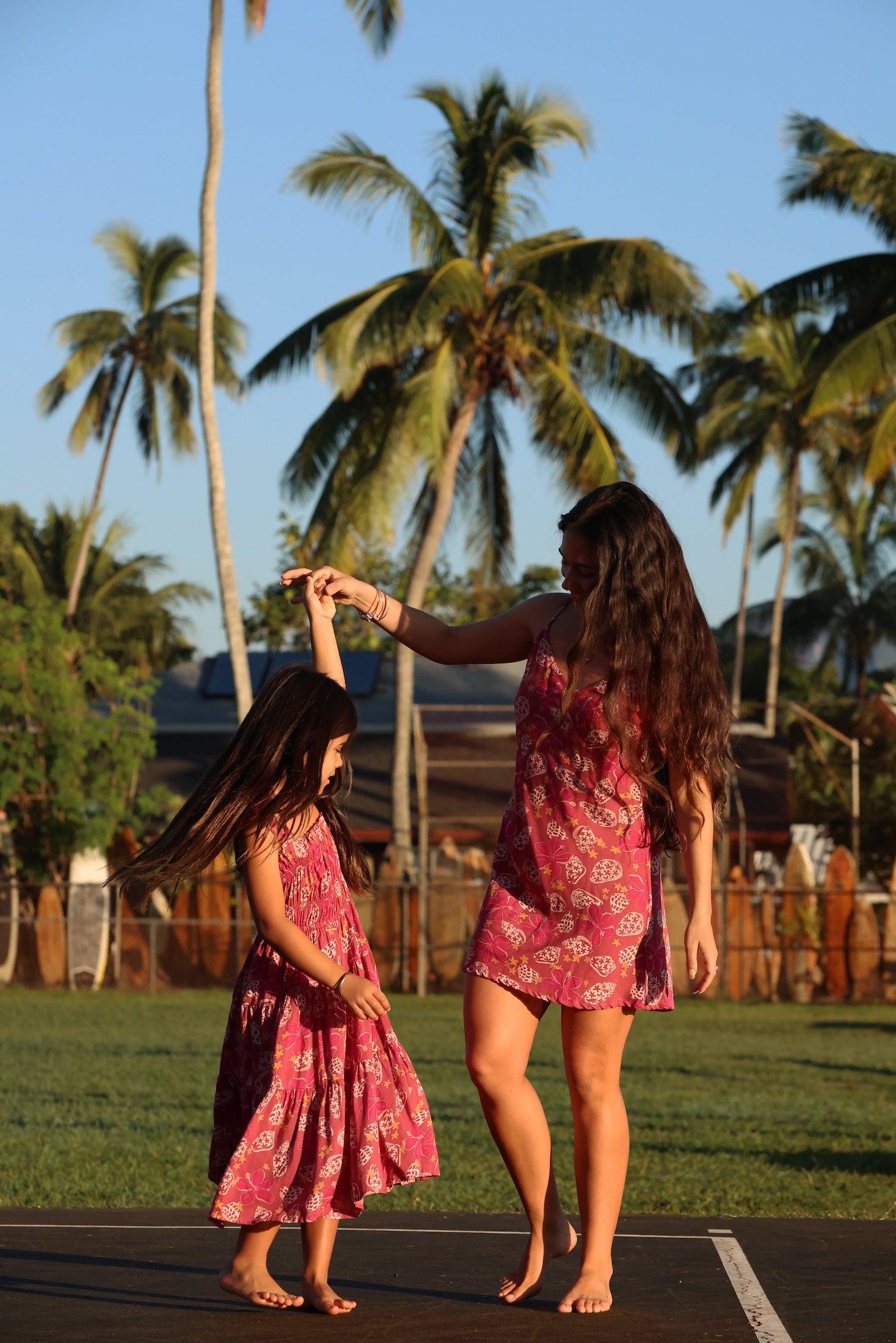 little girl wearing a shell and pua print in pink