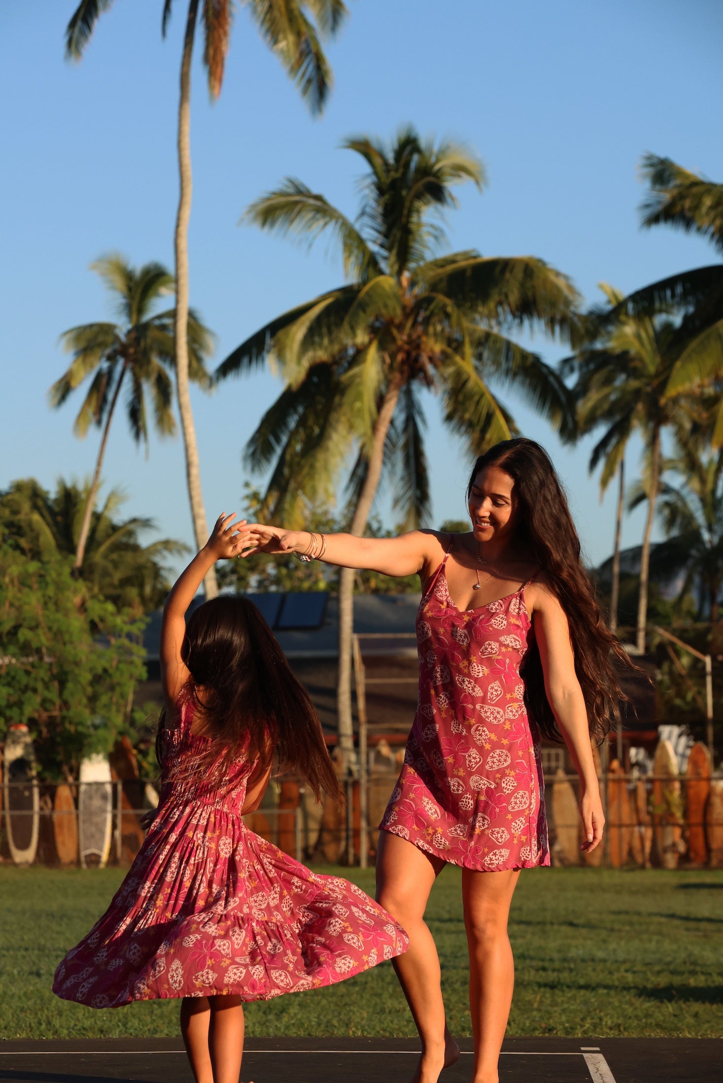 little girl wearing a shell and pua print in pink