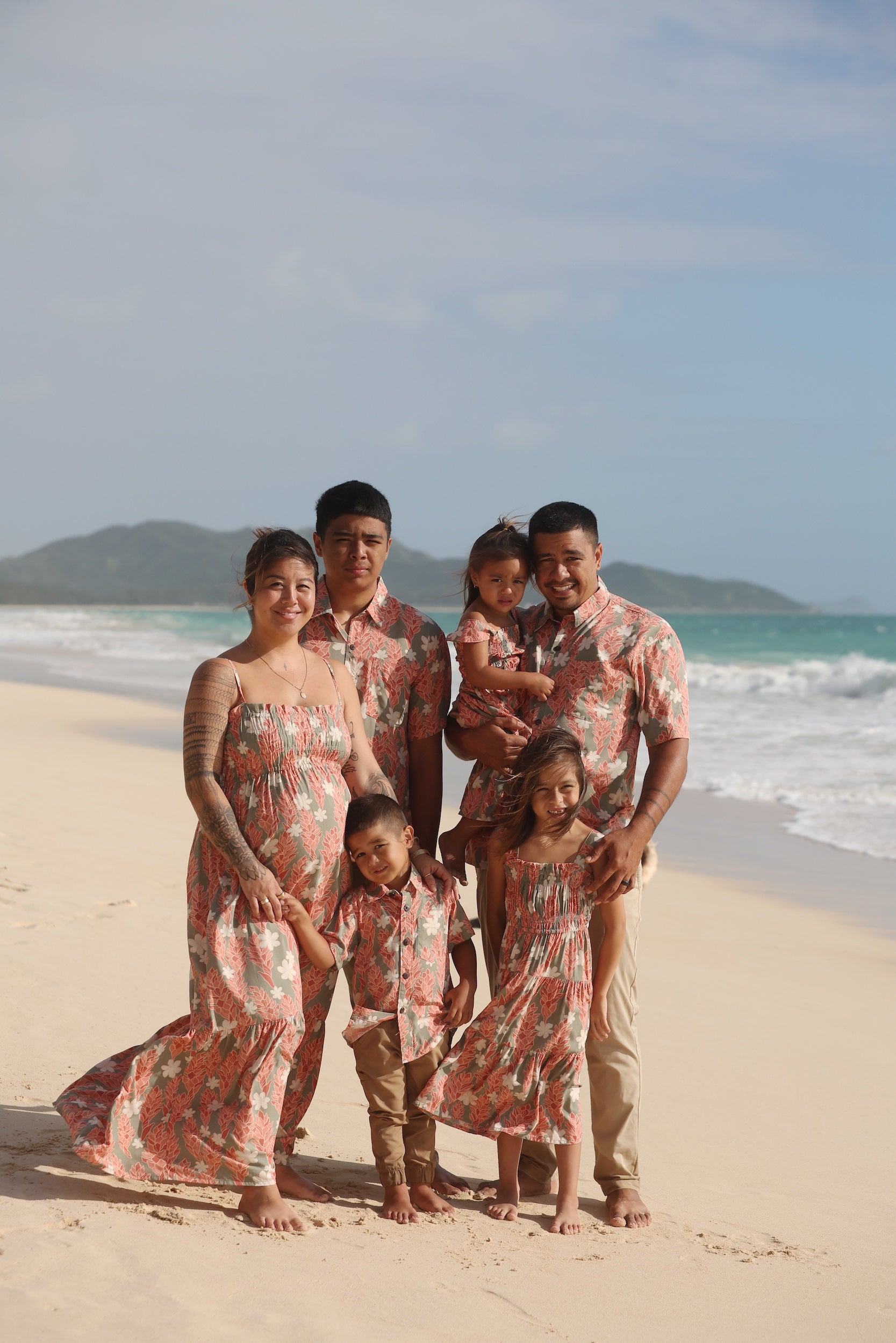man wearing jade aloha button up with tiare ginger print