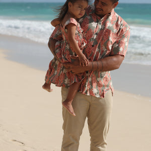 man wearing jade aloha button up with tiare ginger print