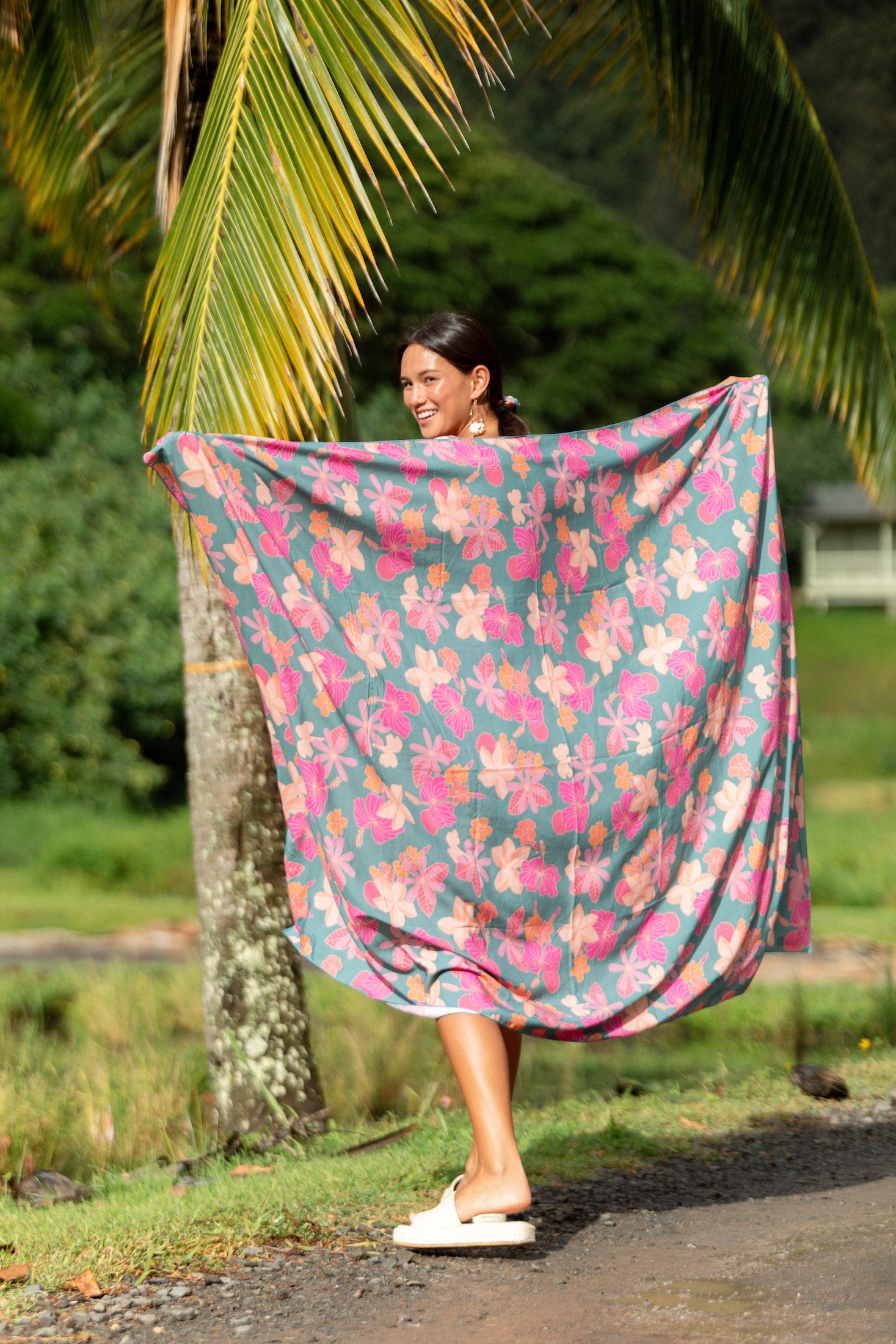 teal pareo with floral pattern 