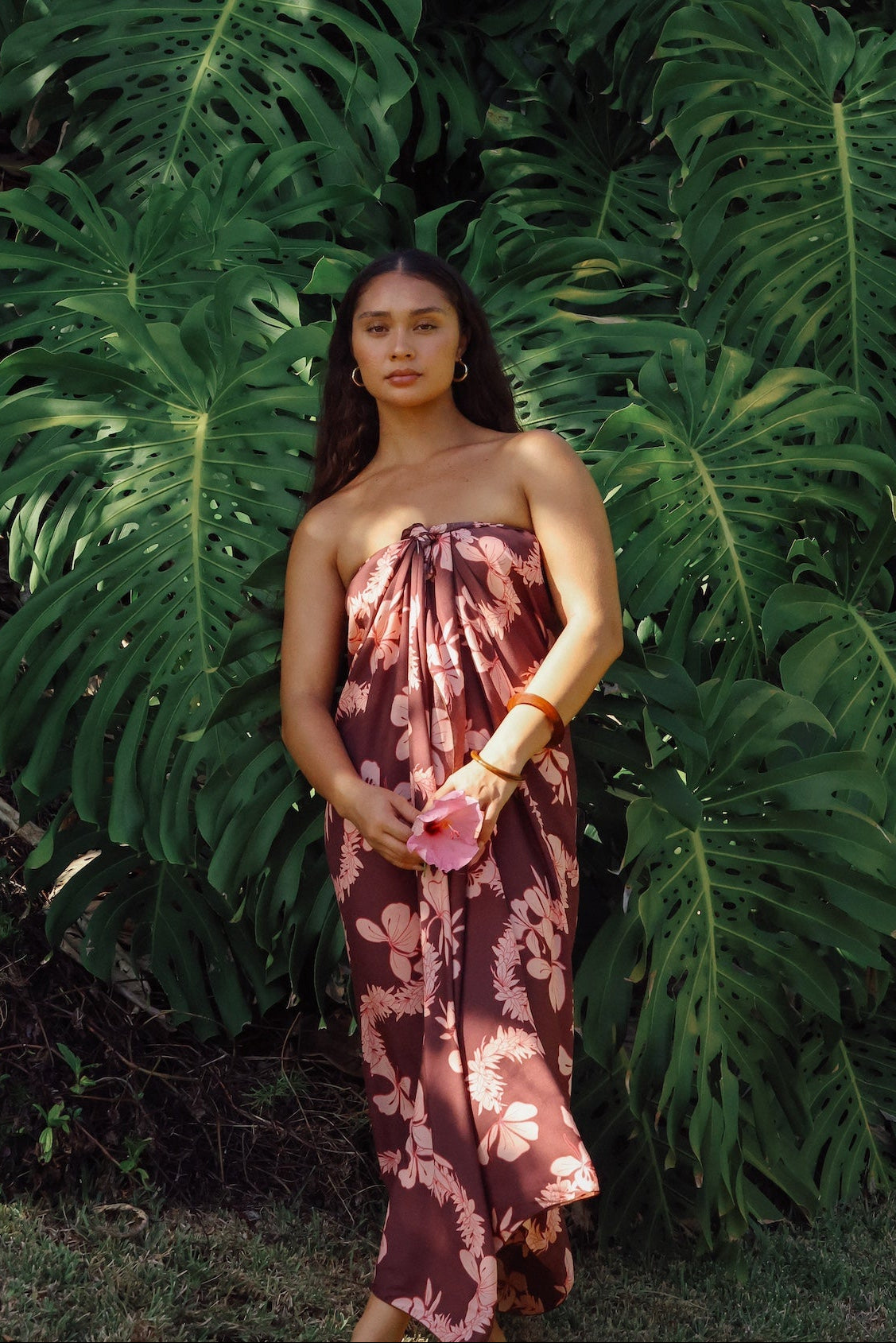 woman wearing pareo with awapuhi print